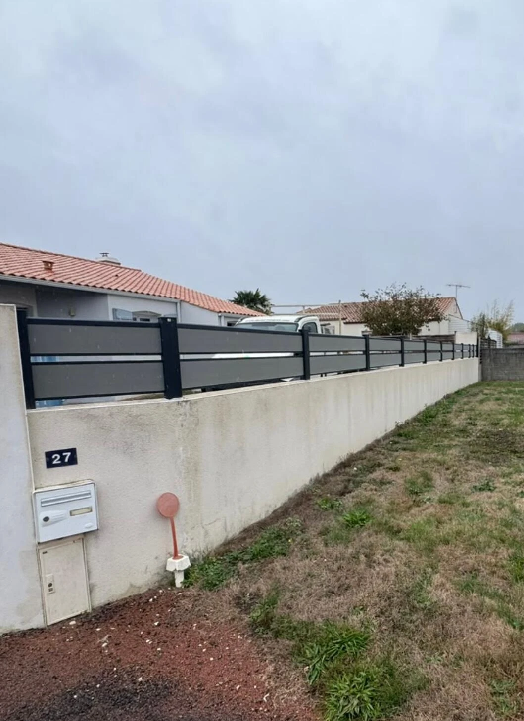 Edification d'une clôture sur muret en composite à St Christophe du Ligneron - 85670