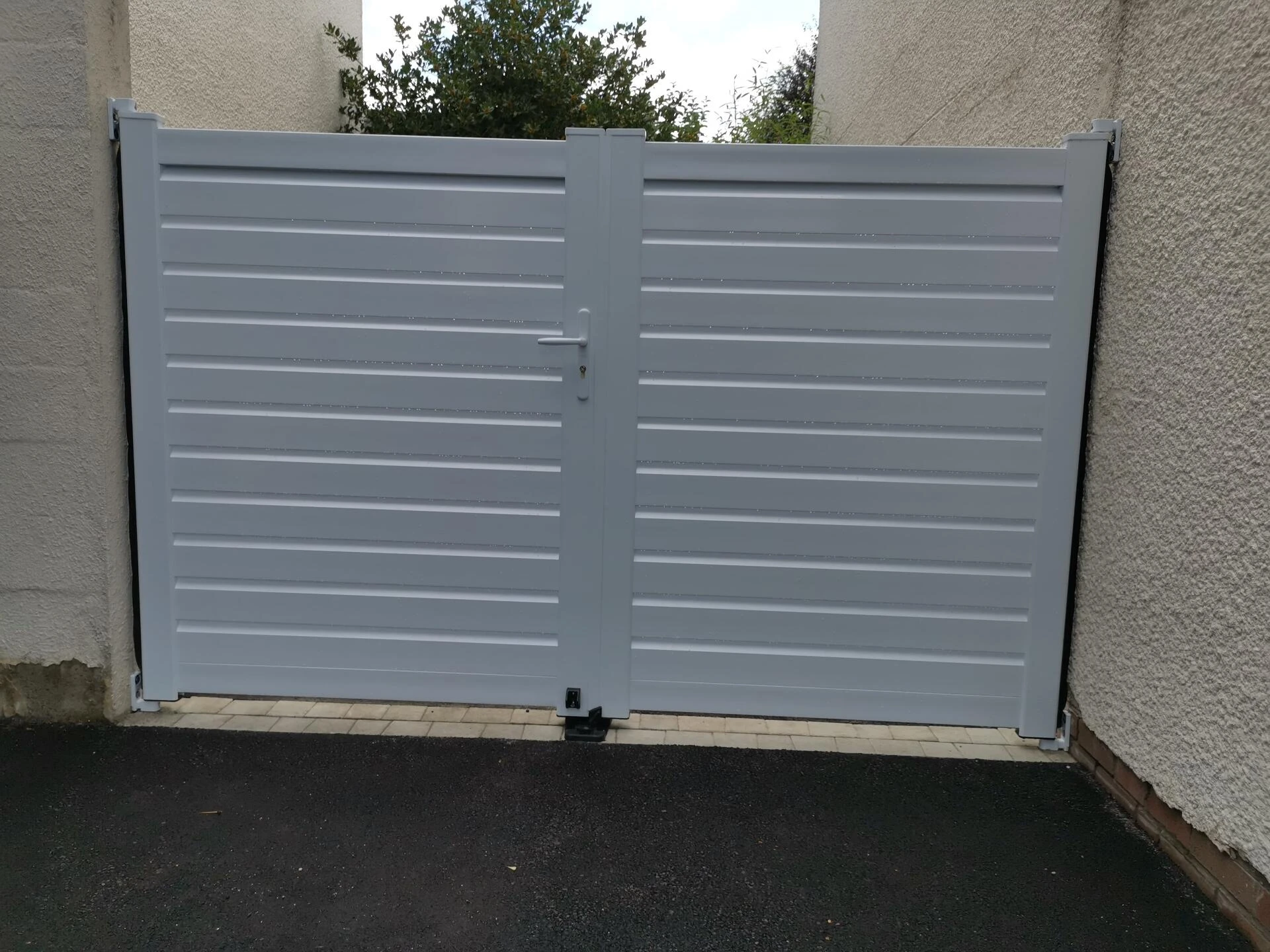 Portail PVC battant