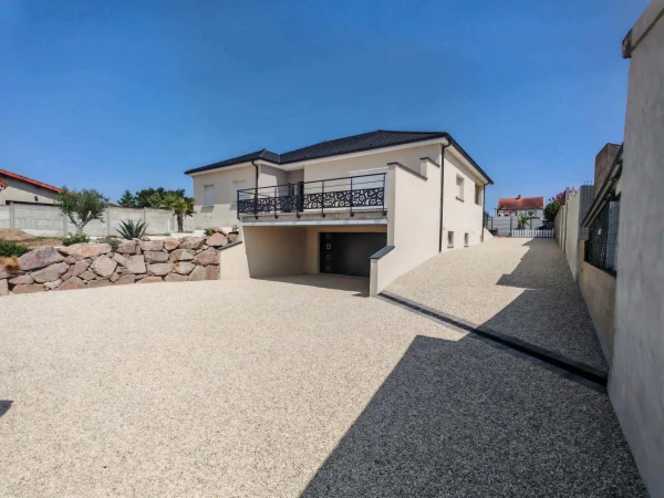 Allée de garage en Gravistar Beige- Pavés la couture Gris